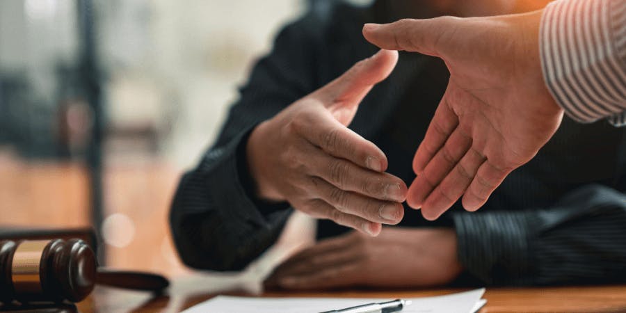 two men shaking hands